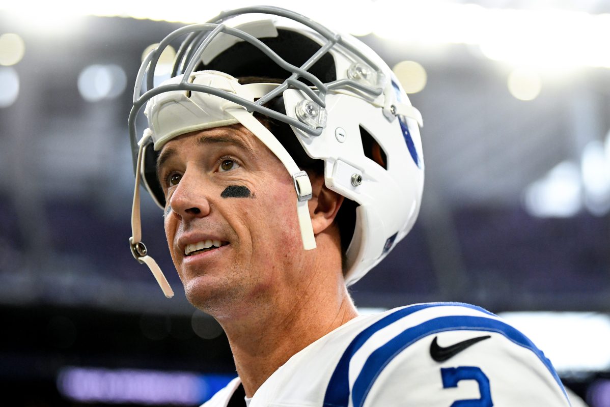 Matt Ryan of the Indianapolis Colts looks on before a game in 2022 in Minnesota. Here's why Ryan isn't retiring from the NFL just yet.