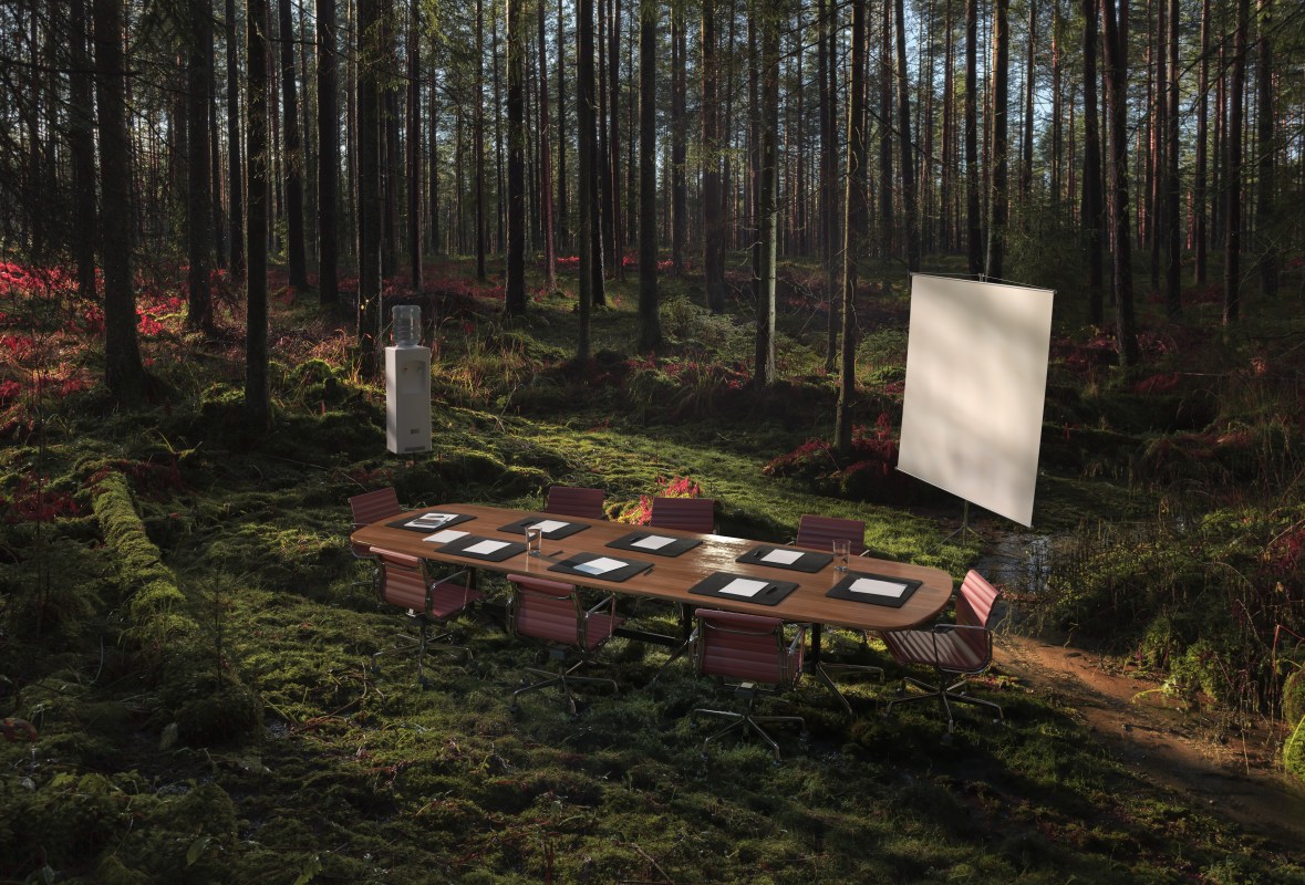 A conference room in the middle of a fantastical forest.