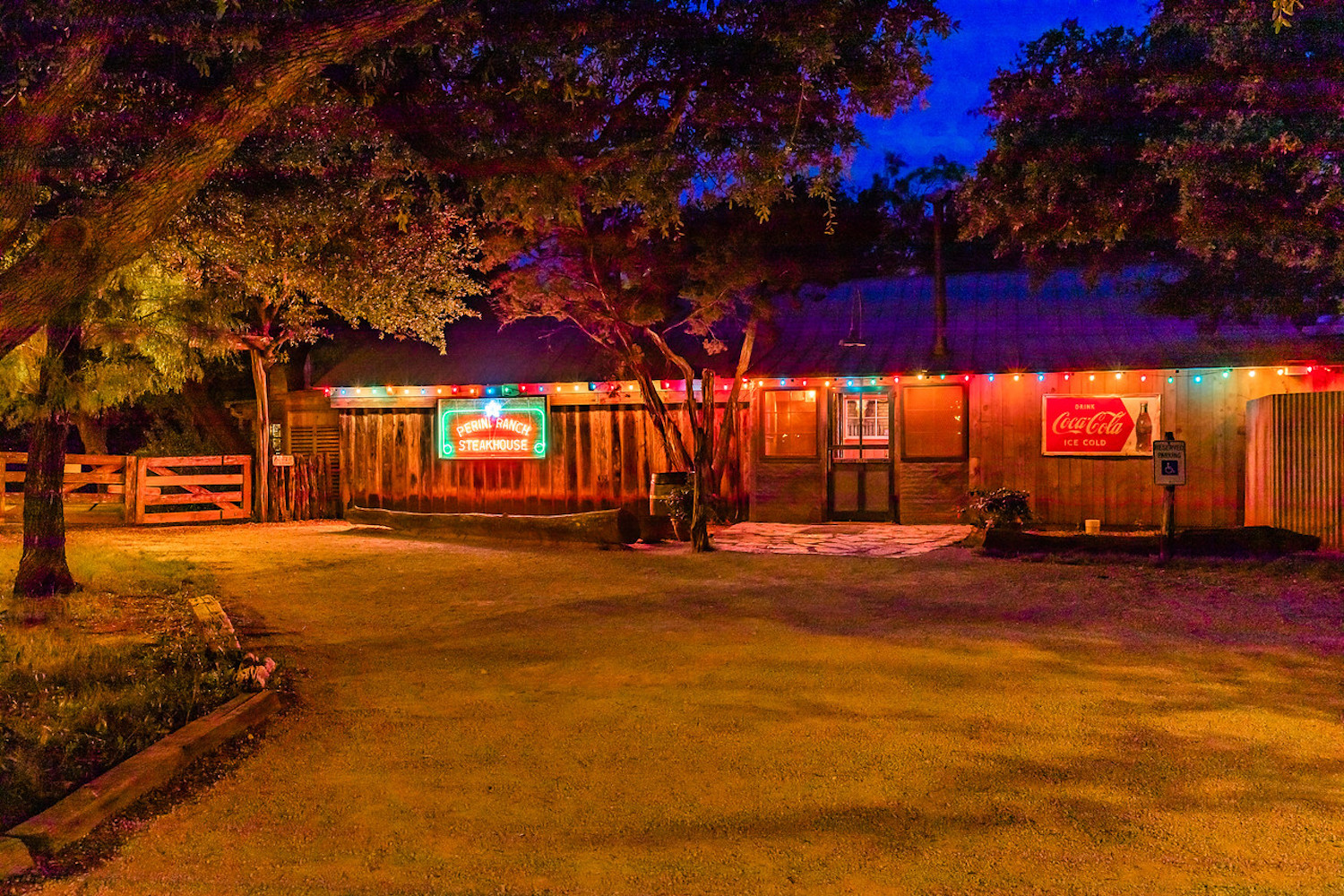 The outside of Perini Ranch at nighttime.