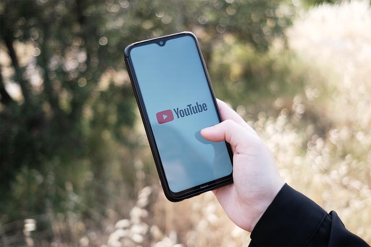 In this photo illustration a YouTube logo seen displayed on a smartphone screen in Athens, Greece on May 5, 2023.