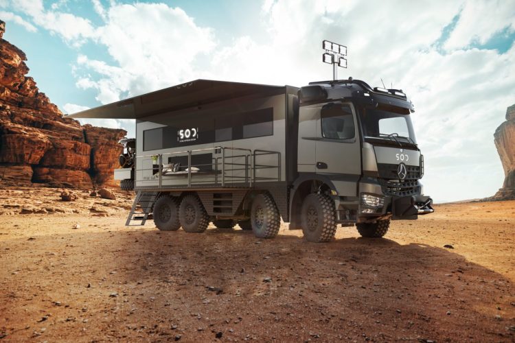 High-tech camping van in desert area