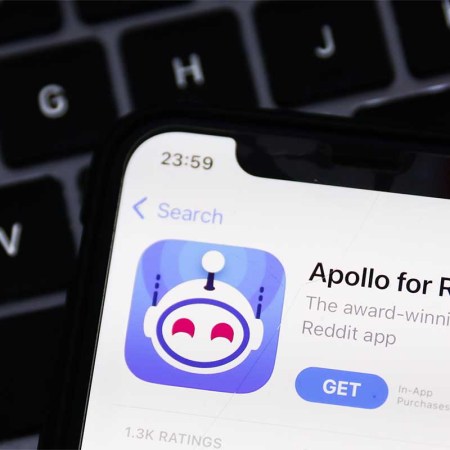 A laptop keyboard and Apollo for Reddit on AppStore displayed on a phone screen are seen in this illustration photo taken in Krakow, Poland on June 8, 2023