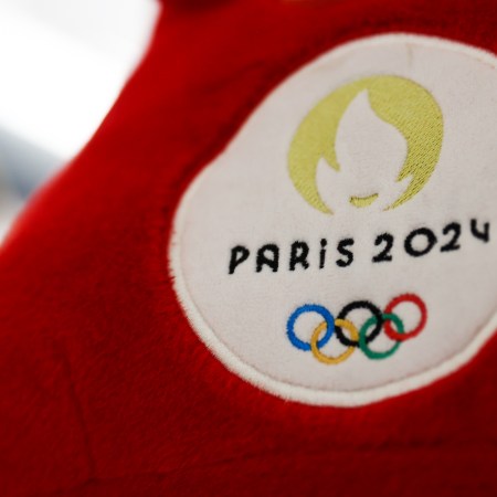 Paris 2024 Olympics logo is seen on the mascott in a store in Nice, France