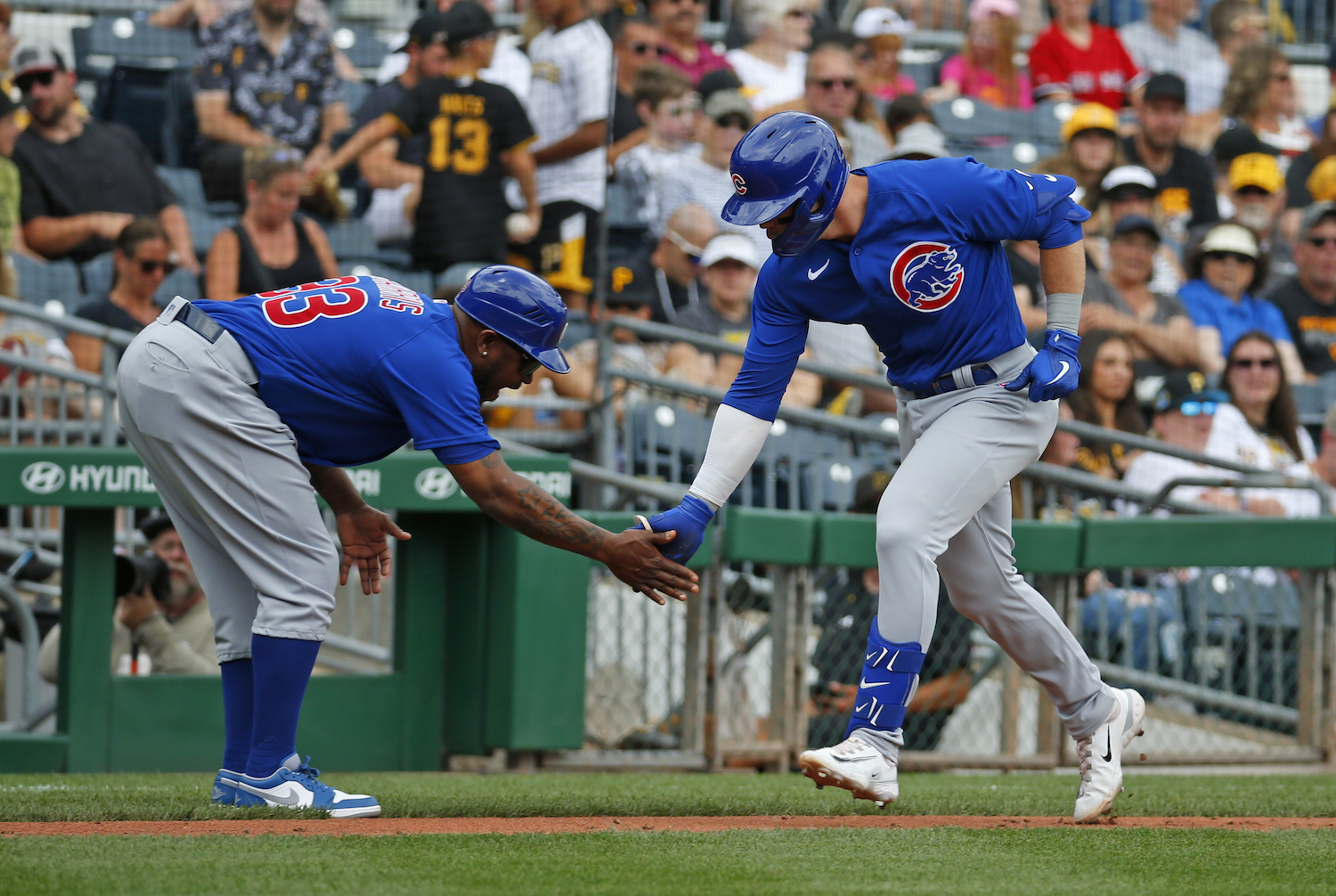 two baseball players high fiving