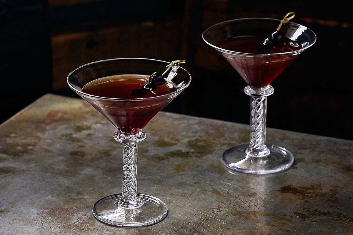 two Manhattan cocktails