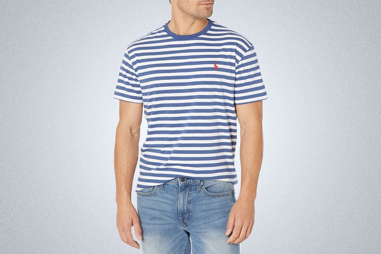 a model in a blue and white Polo Ralph Lauren Striped T-Shirt on a grey background