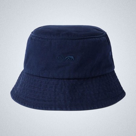 a blue Taylor Stitch Bucket Hat on a grey background