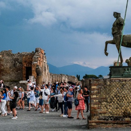 Tourists crowding the Archaeological Park of Pompeii.