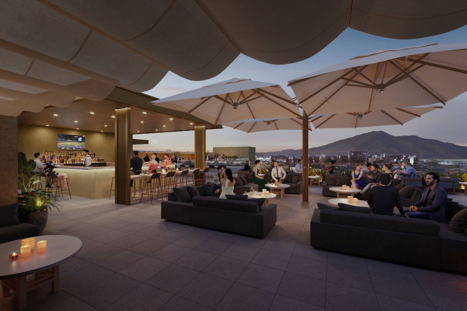 outdoor rooftop bar at sunset with big umbrellas