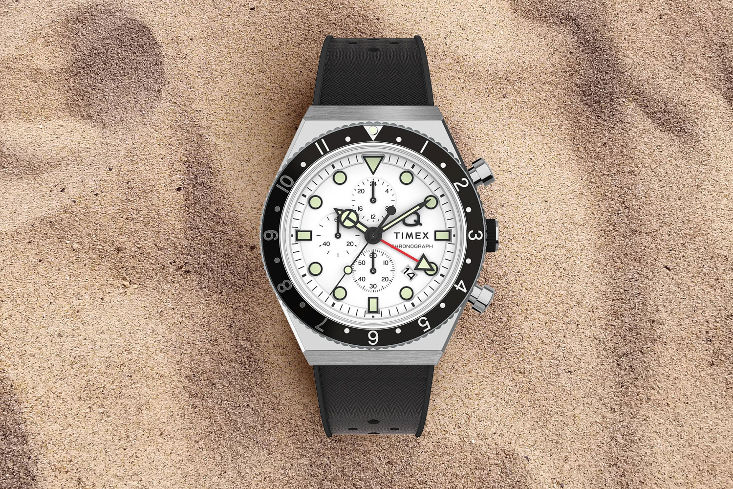 watch on the sand.