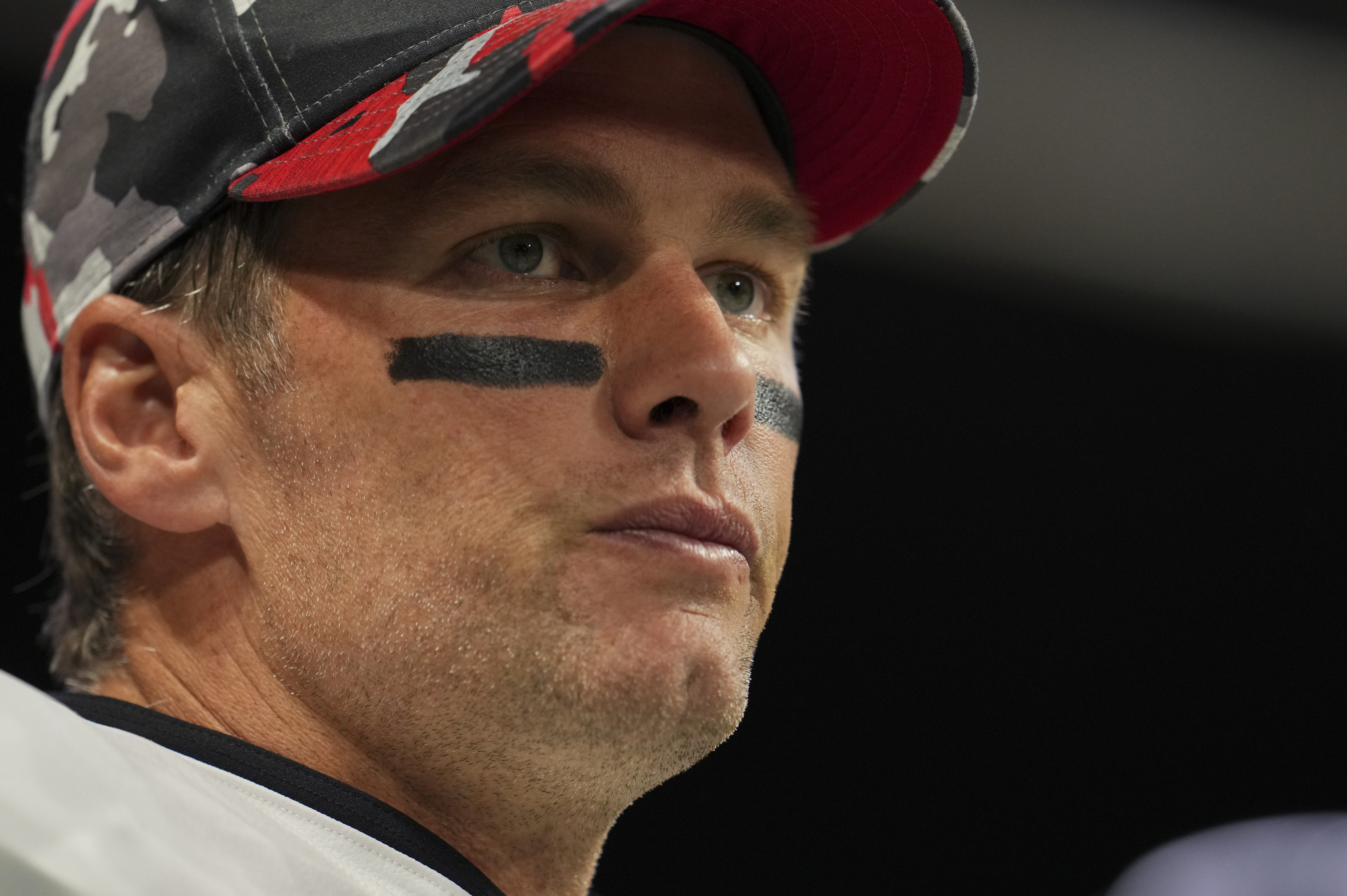 Tom Brady gets ready to run onto the field before a game.