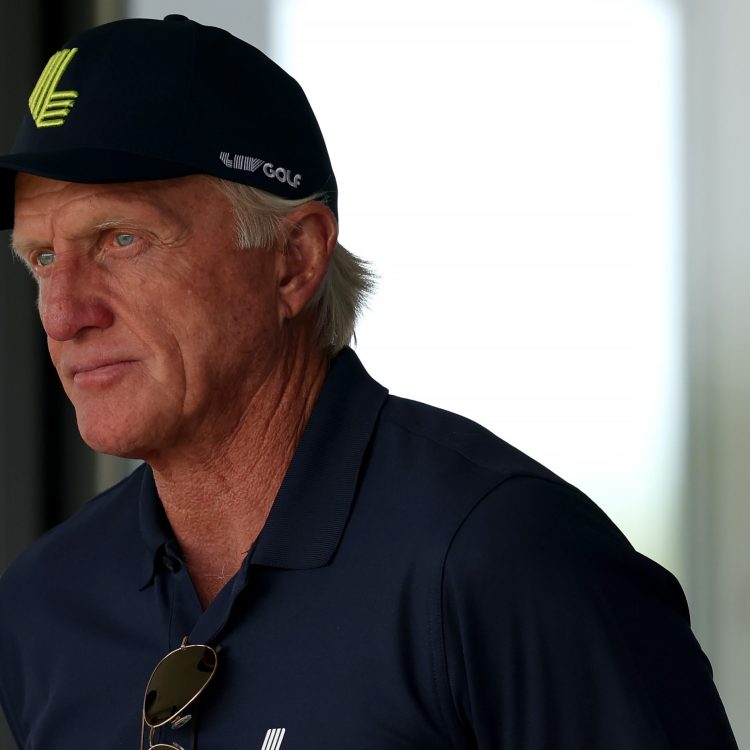 LIV Golf CEO Greg Norman watches from a suite on the 18th green.