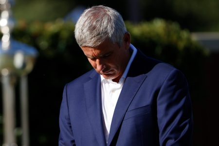 PGA Tour commissioner Jay Monahan leads a moment of silence.