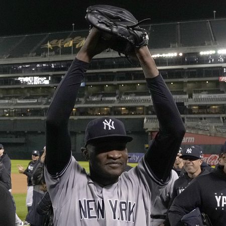 Yankee pitcher Domingo German celebrates his perfect game against the Oakland Athletics.