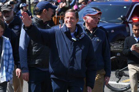 U.S. Senator Richard Blumenthal waves to a crowd.