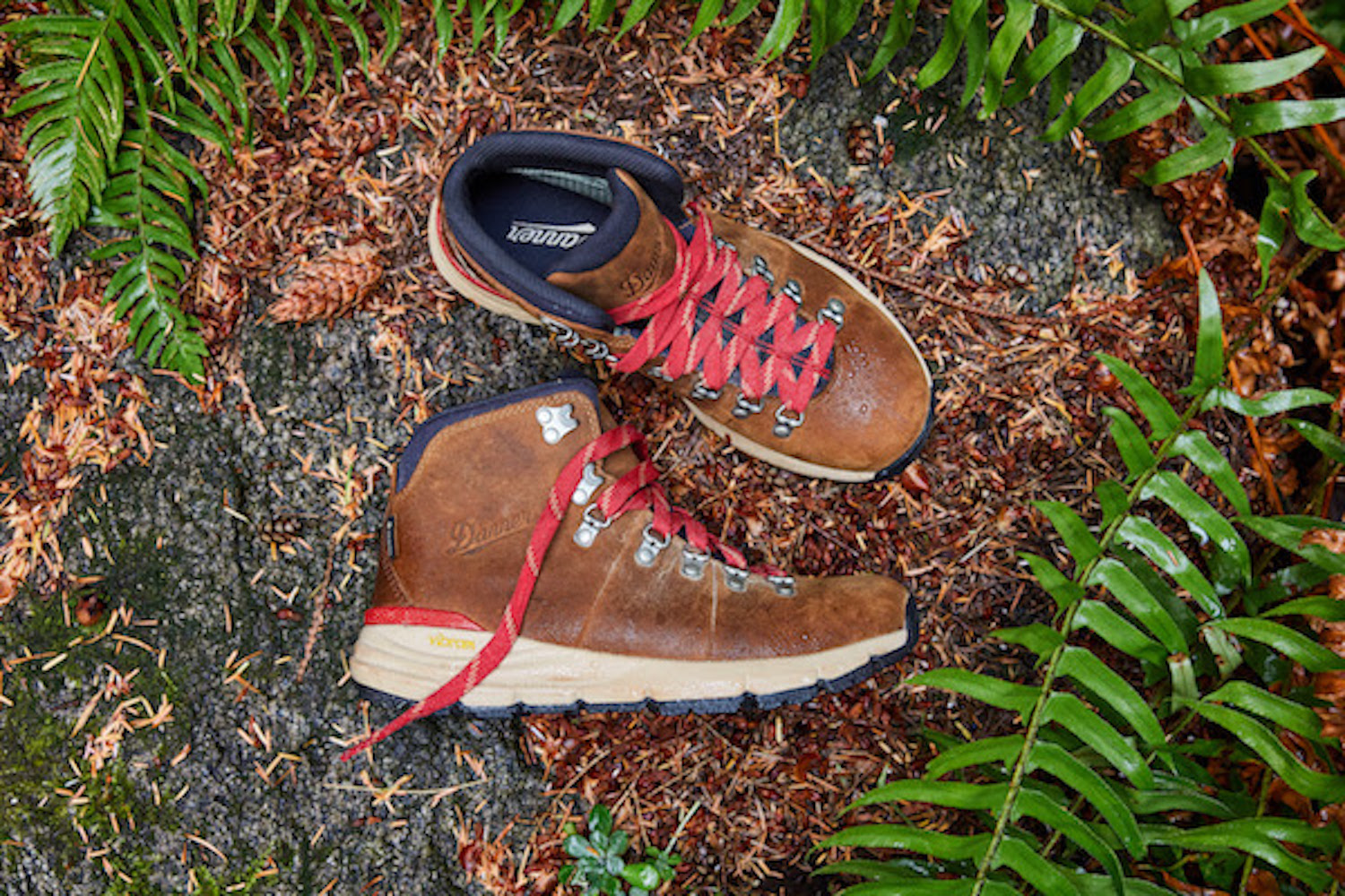 a pair of the Danner Mountain 600 Leaf GTX boots on a grassy floor