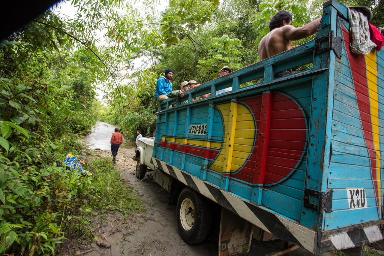 A colorful truck with a hitch ships a group of SUP adventurers through the jungle to the Madre de Dios river in Peru