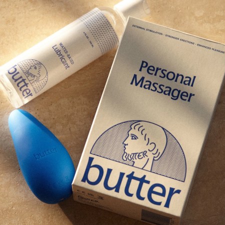 Butter Wellness products on a white wooden table