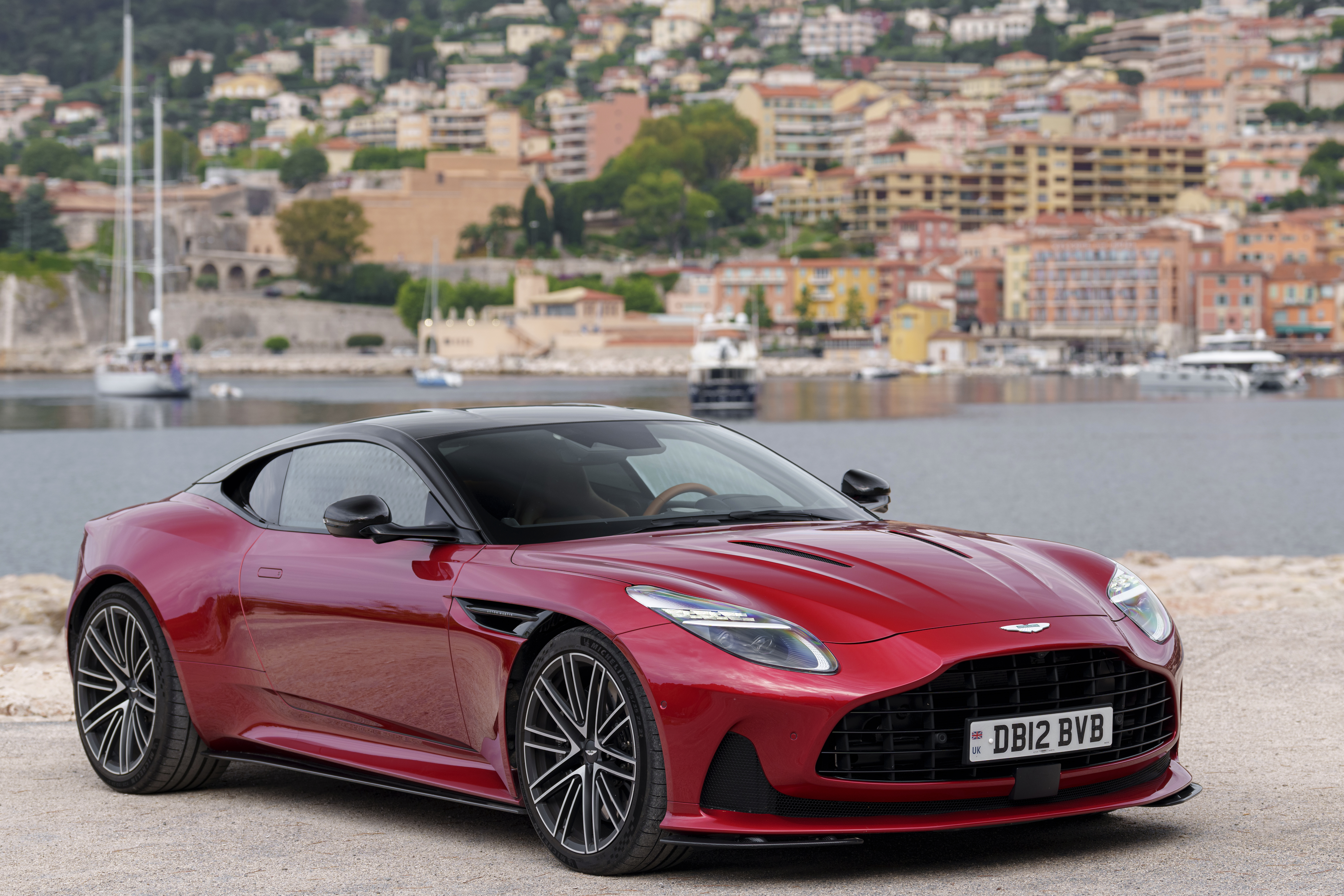 The Aston Martin DB12 in hyper red color