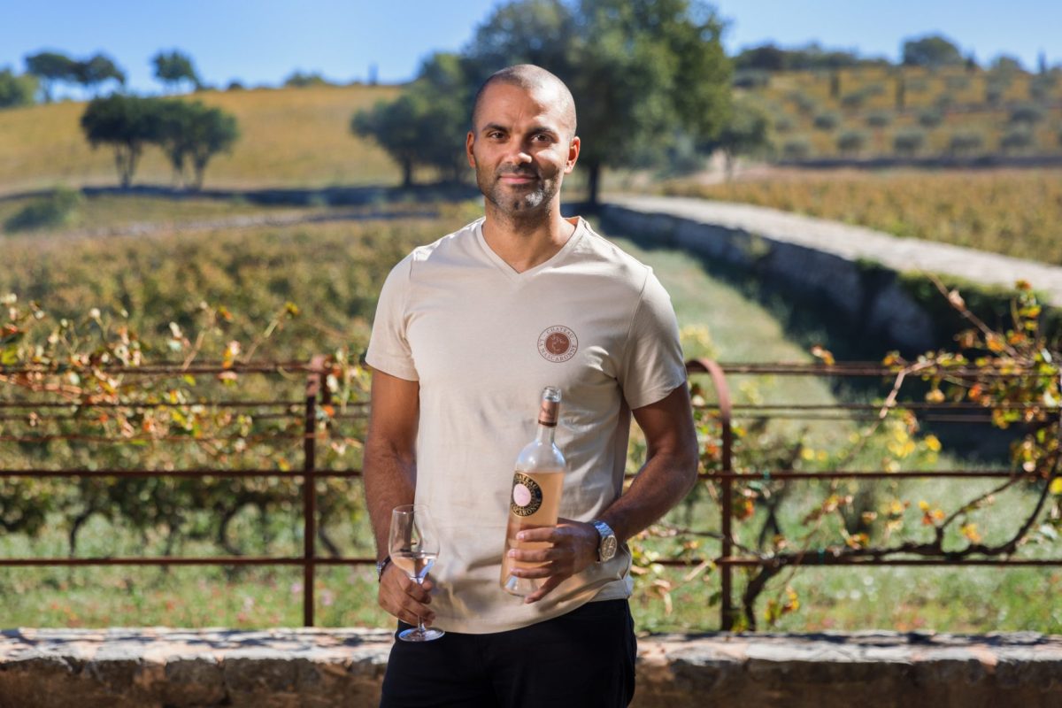 Tony Parker in front of a French vineyard.