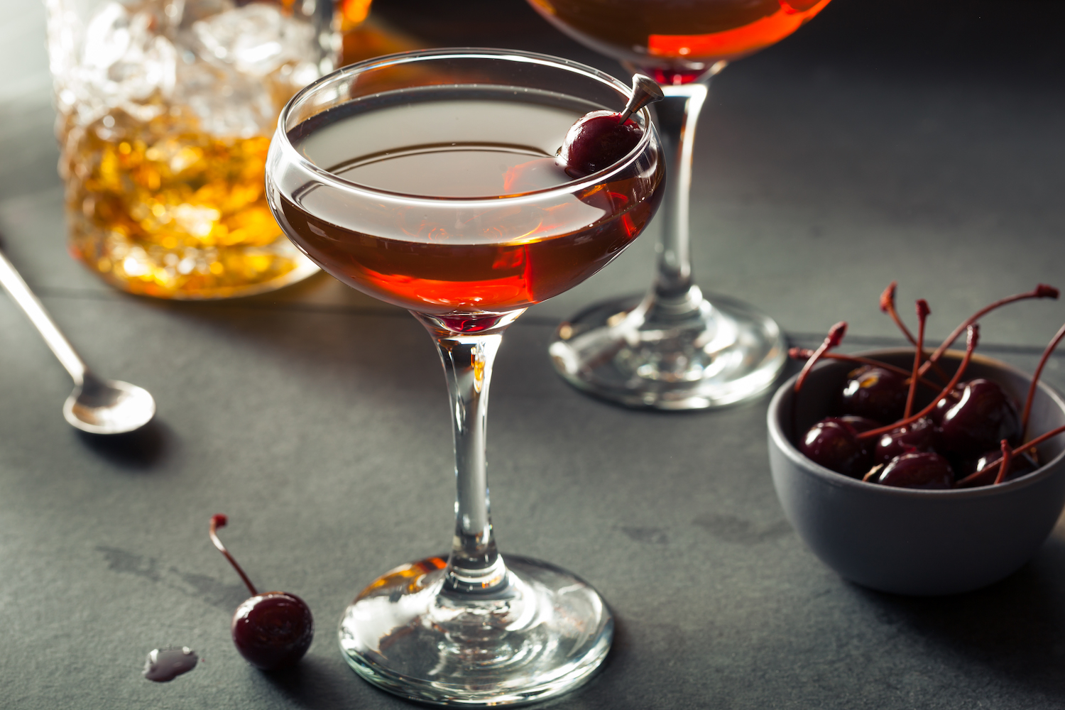 Homemade Rye Bourbon Manhattan with a Cherry Garnis