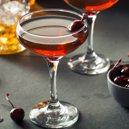 Homemade Rye Bourbon Manhattan with a Cherry Garnis