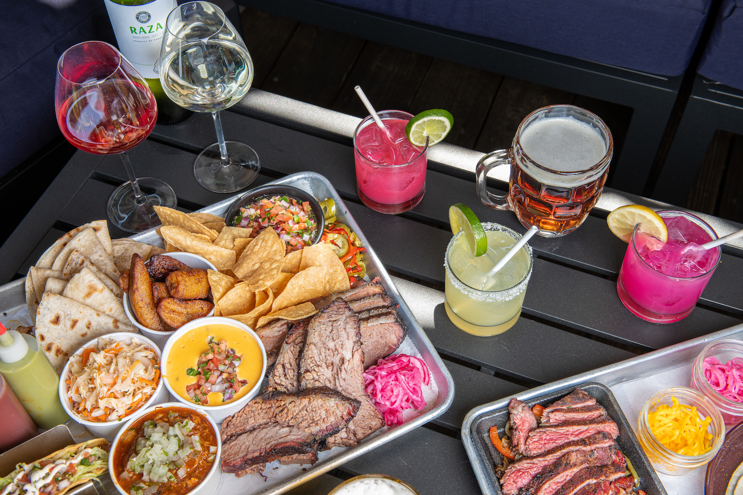 trays of Tex-Mex food and cocktails