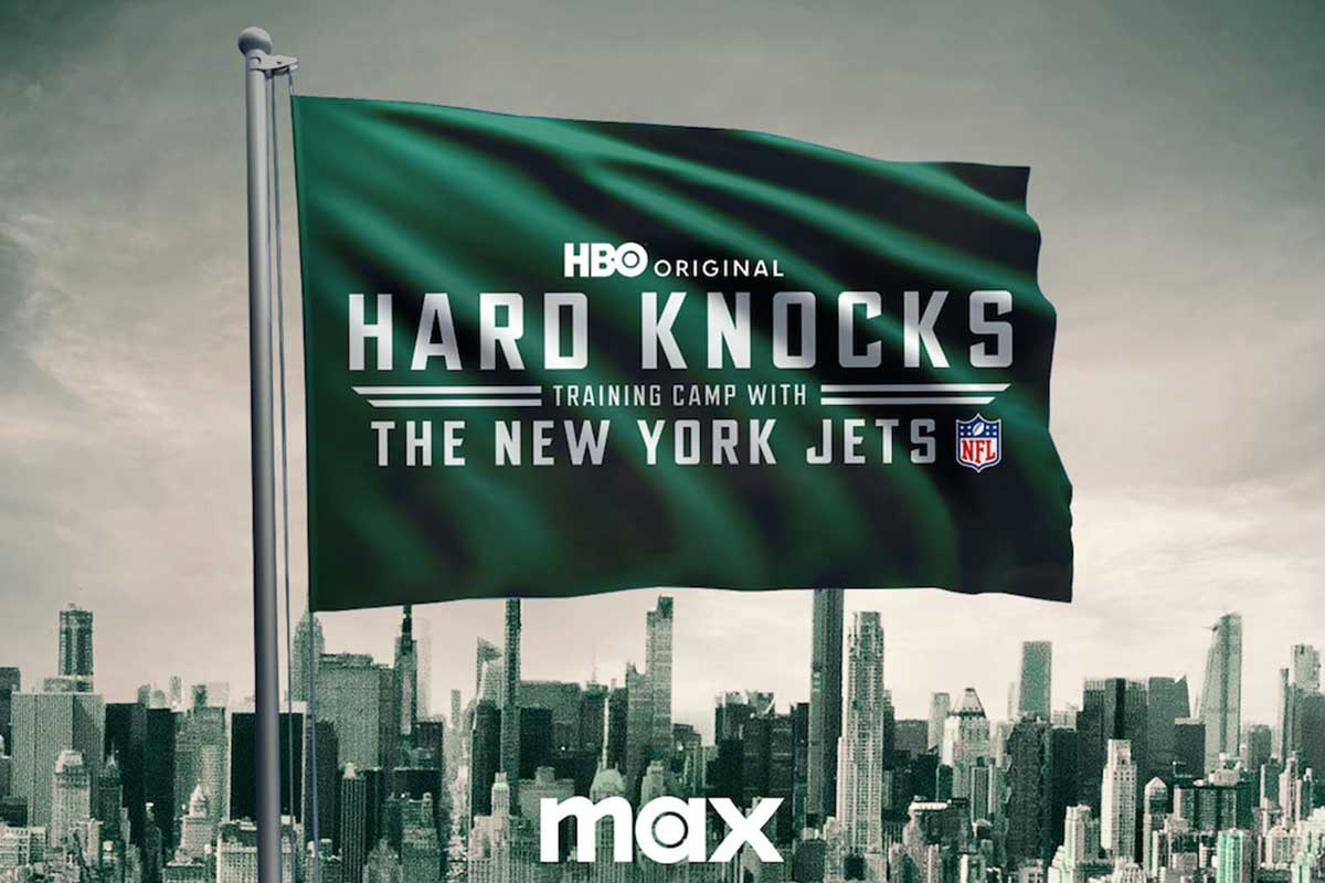 A green flag with the Hard Knocks logo, announcing the show's return to TV with the New York Jets