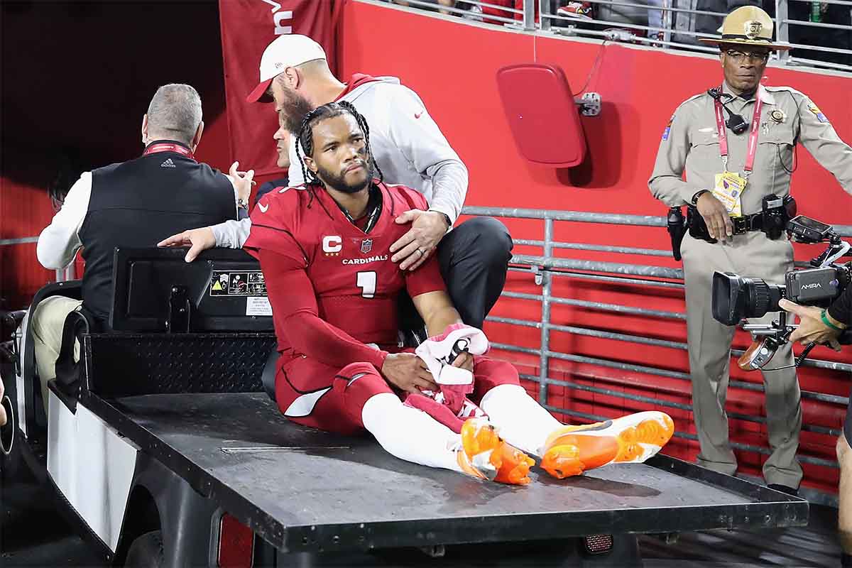 Quarterback Kyler Murray #1 of the Arizona Cardinals is carted off the field after being injured against the New England Patriots during the first quarter of the game at State Farm Stadium on December 12, 2022 in Glendale, Arizona. The QB recently spoke of the long process back from rehab.