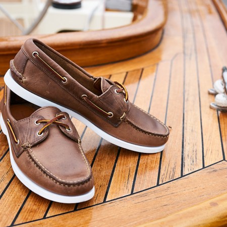 Pair of Rancourt loafers on the deck of a boat.