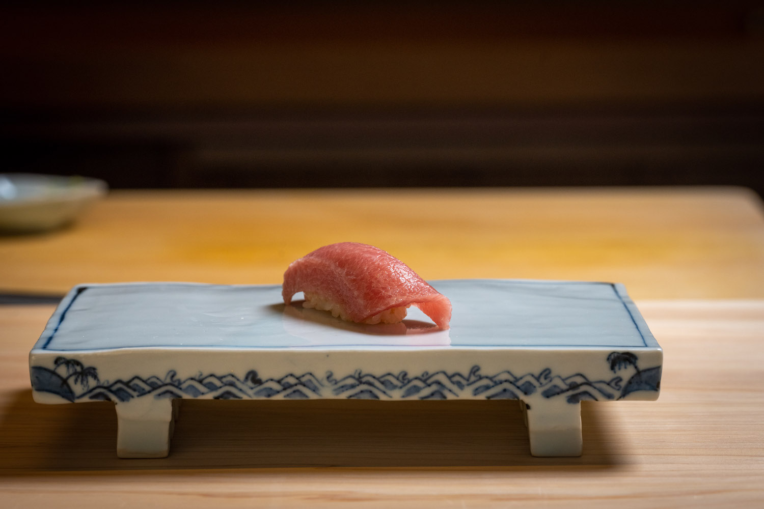 Nigiri by itself on a small plate