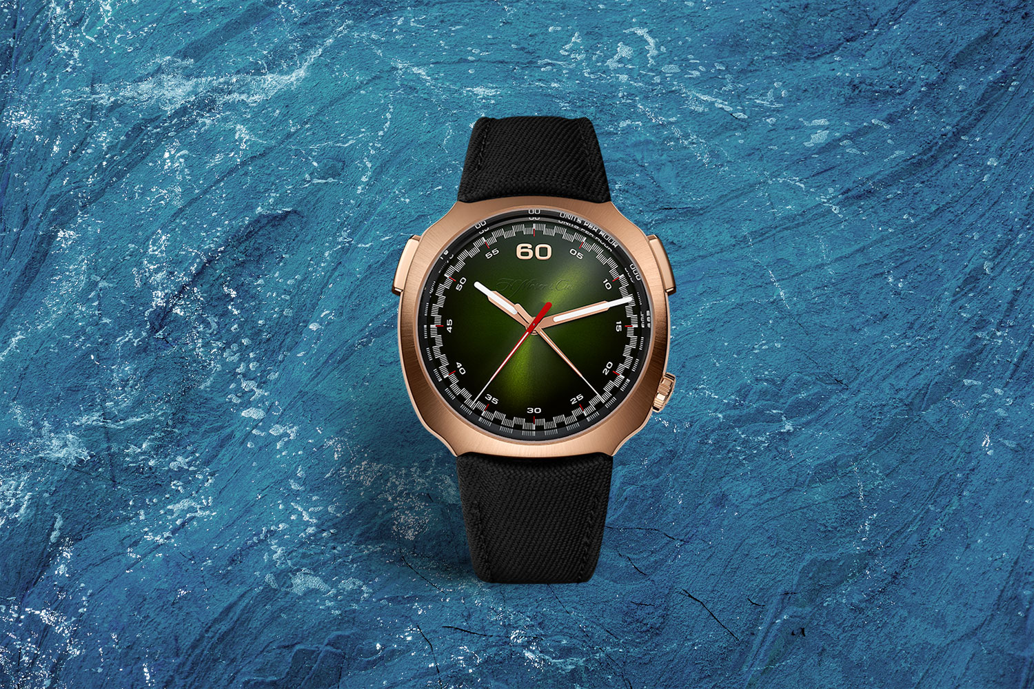 Green, black and gold watch.