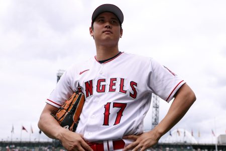 Shohei Ohtani looks on during Gatorade All-Star Workout Day at T-Mobile Park.