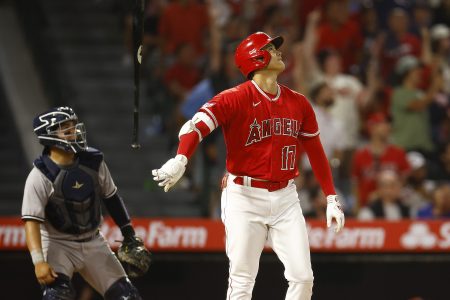 Shohei Ohtani reacts after hitting a home run against the Yankees.
