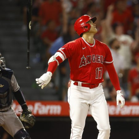 Shohei Ohtani reacts after hitting a home run against the Yankees.