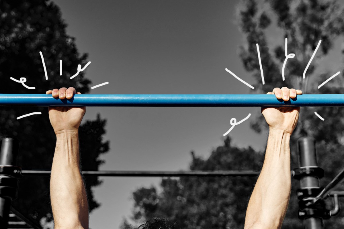 An image of hands gripping a pull-up bar.