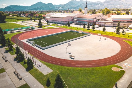 A view of a sports complex with various fields and courts.