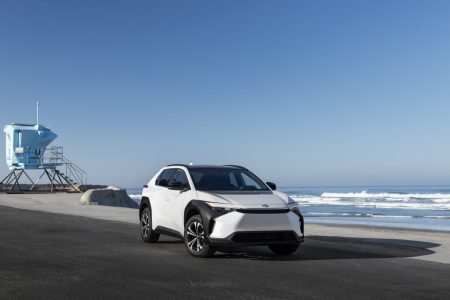 The 2023 Toyota BZ4X in white parked on a beach