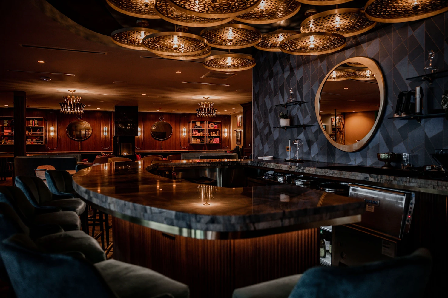 Dimly-lit bar area with dark wood and other dark decor