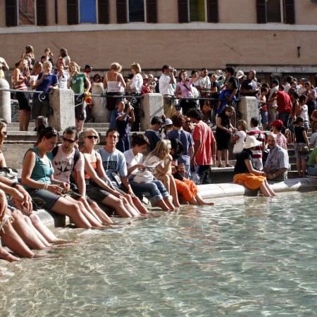Tourists at Trevi fountain on August 12, 2006 in Rome,Italy