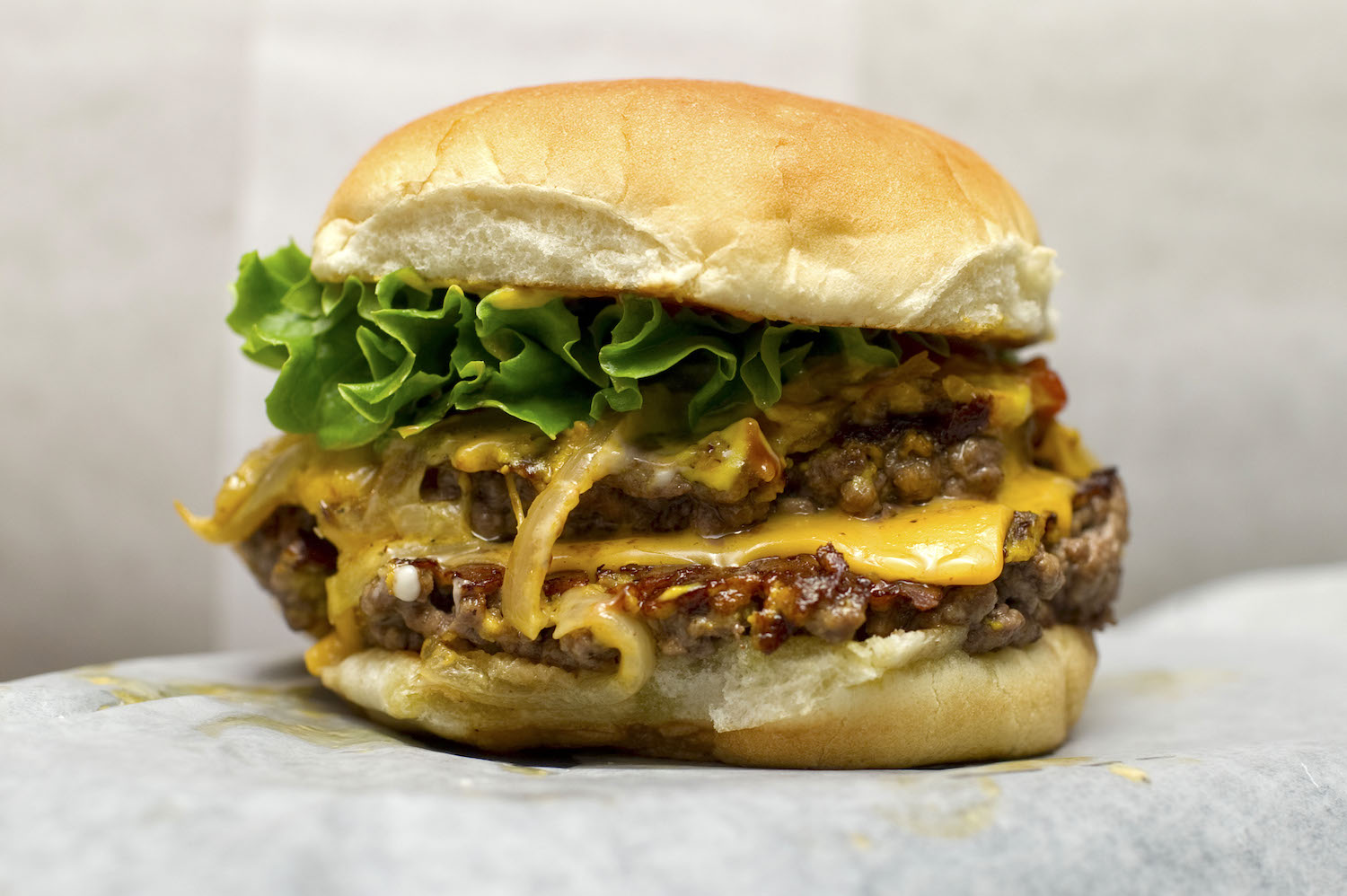 Double Jarge-style saucy burger from humble priest in toronto