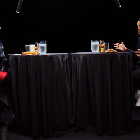 "Hot Ones" host Sean Evans with Steph Curry.