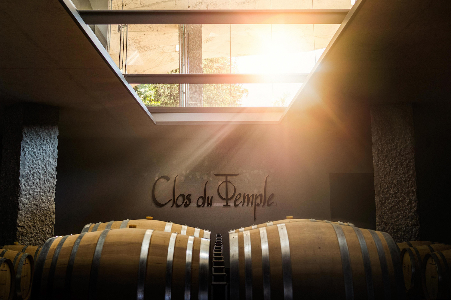 the barrel room at clos du temple winery in languedoc