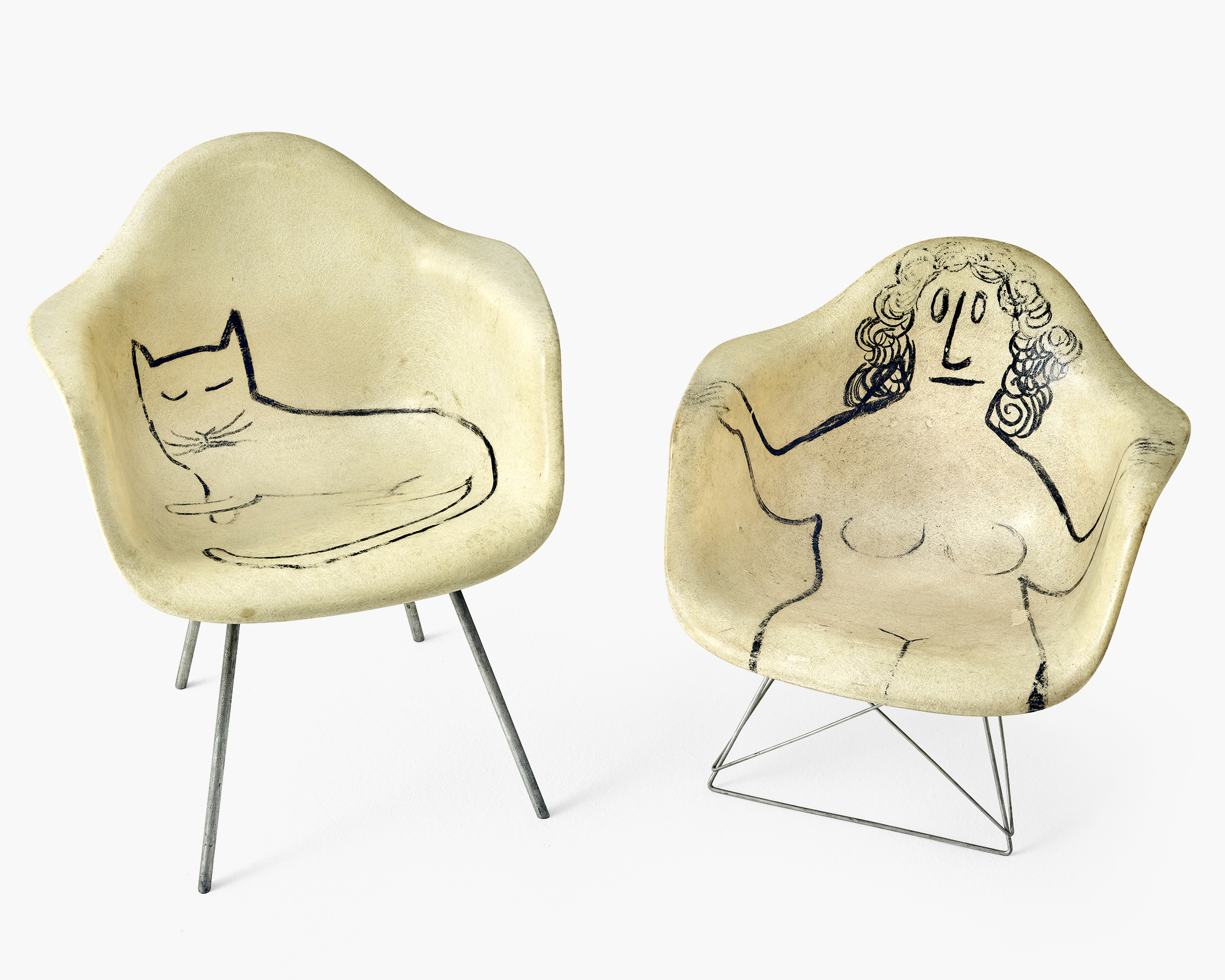 Eames armchairs with Steinberg illustrations