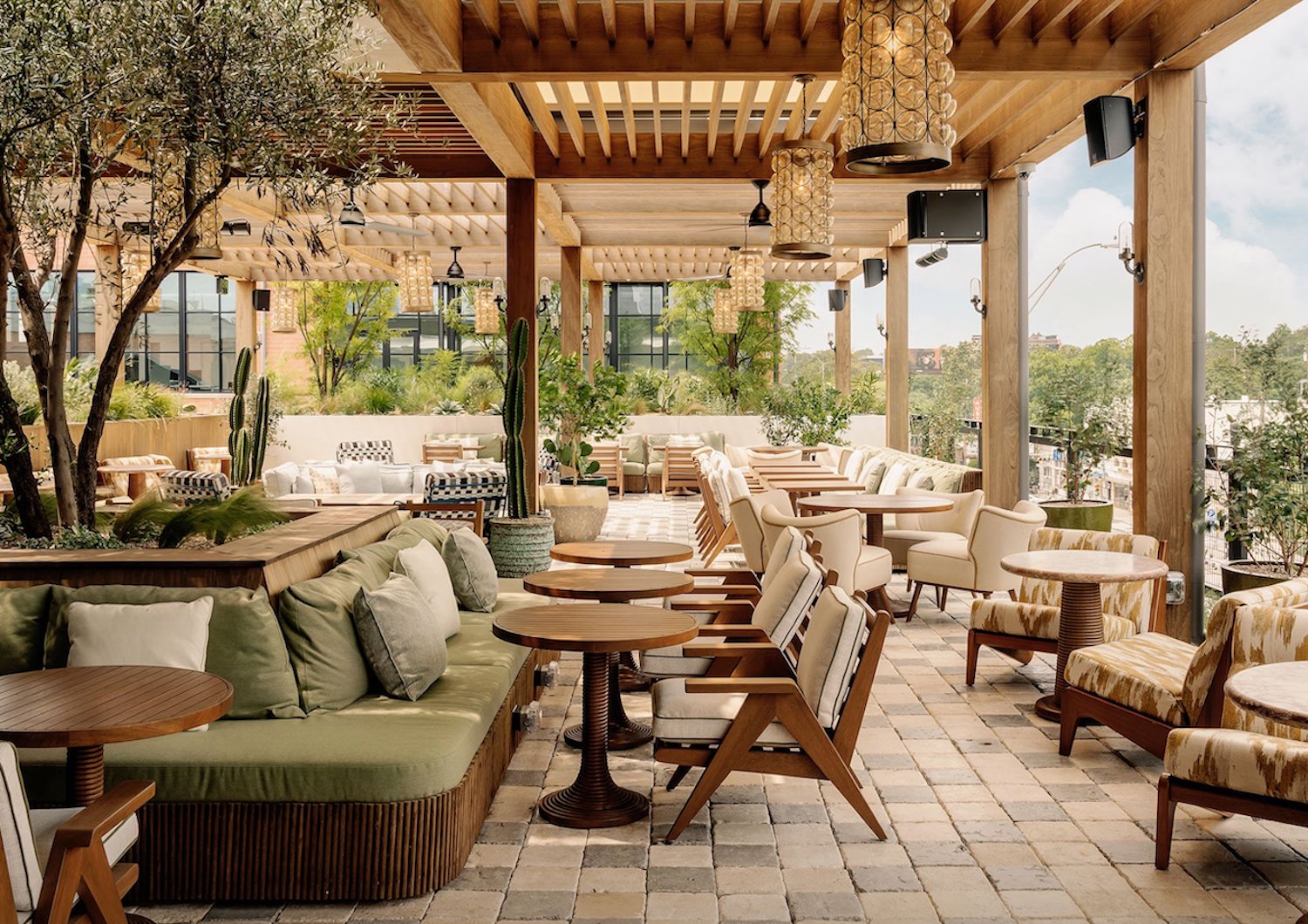 Rooftop of Soho House with earth-toned decor