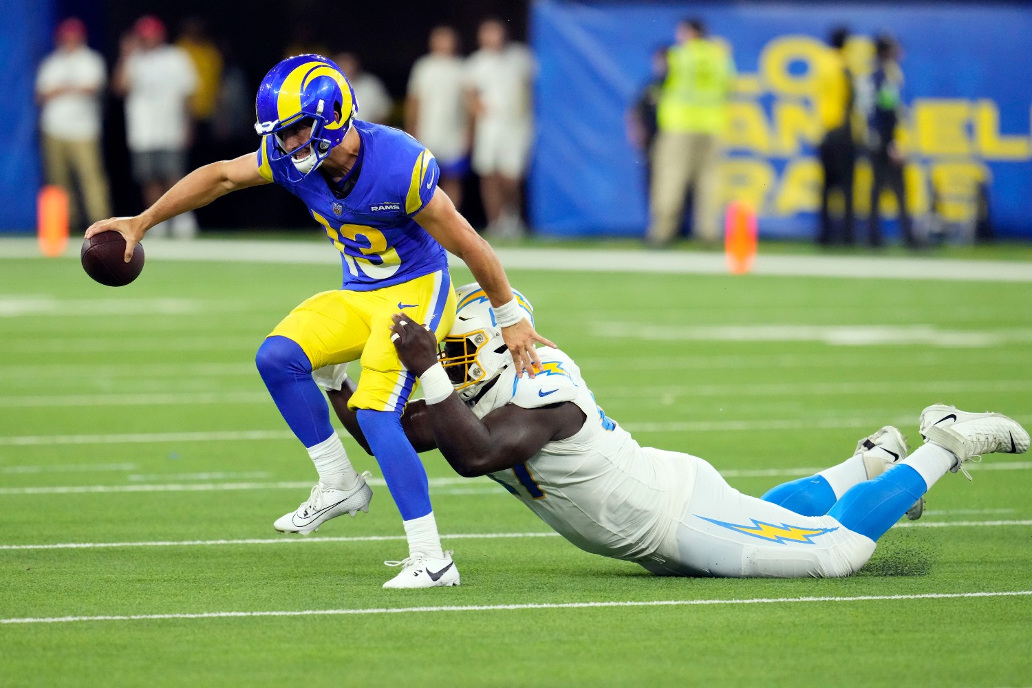 CJ Okoye in the middle of a tackle