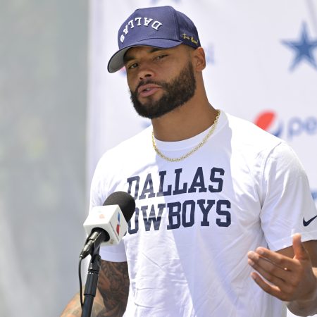 Dak Prescott of the Cowboys speaks at a news conference.