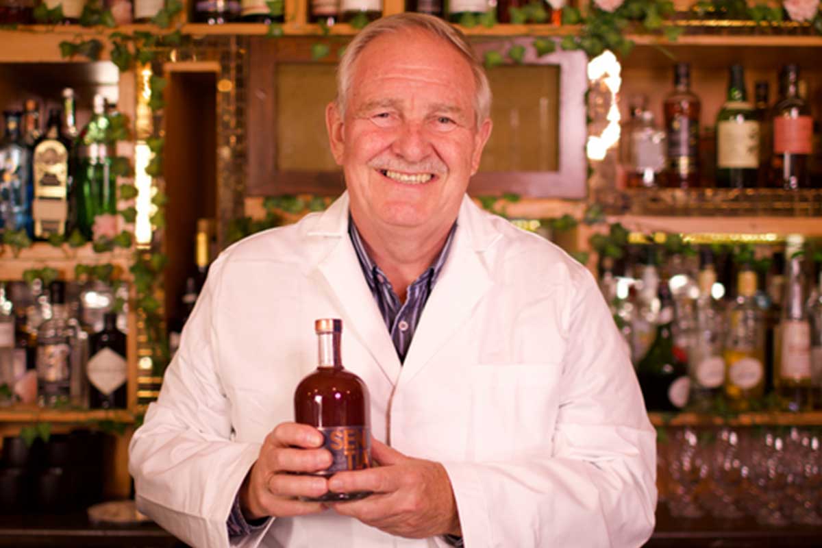David Nutt holding his current non-alcoholic drink, Sentia