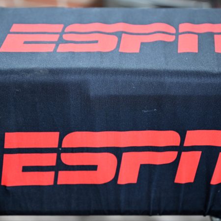 A view of the ESPN logo on a camera at a game.
