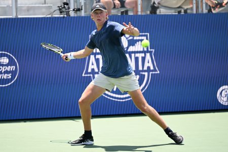 Ethan Quinn hits a shot during the first round of the ATP Atlanta Open.